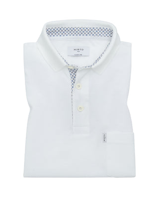 Polo blanco detalles de estampado floral by MIRTO