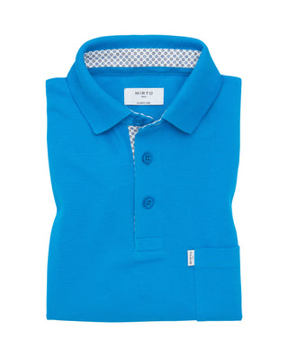 Polo azul detalles de estampado floral by MIRTO