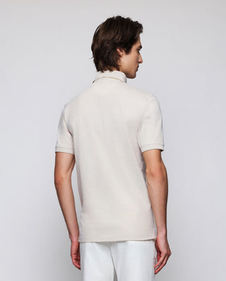 Beige piqué polo in tone rivet