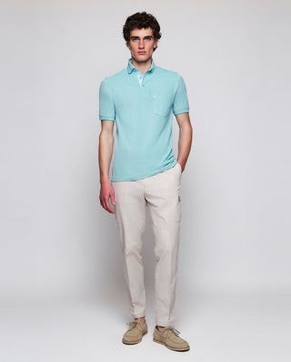 Green piqué polo in tone rivet