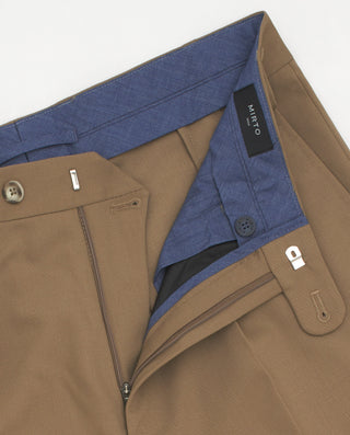 Beige pleated trousers