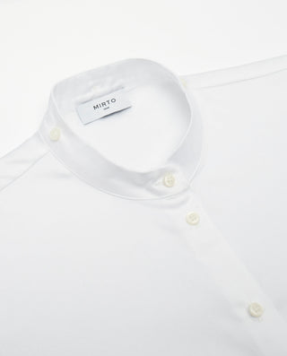 White cotton shirt with floral trims