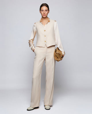 Blusa crema de seda elástica